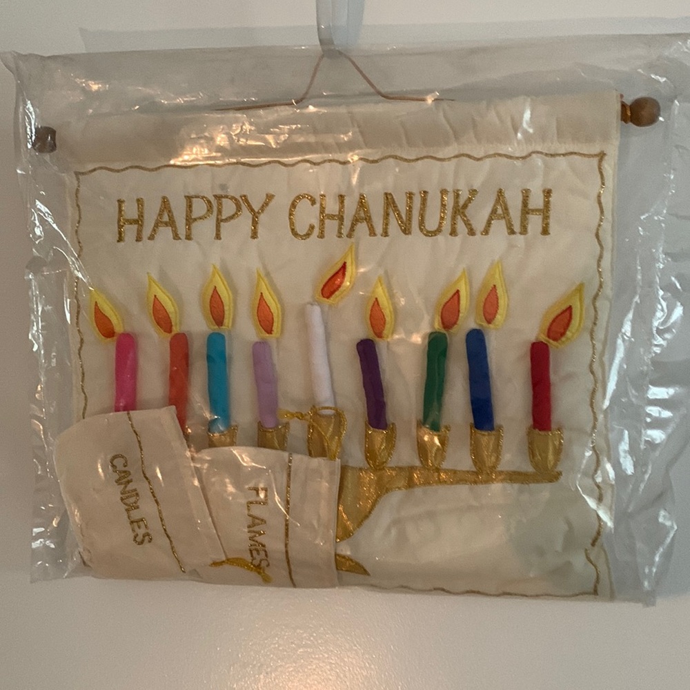 NWOT Soft sculptured Hanukkah mrenorah has bags for candles-and flames
